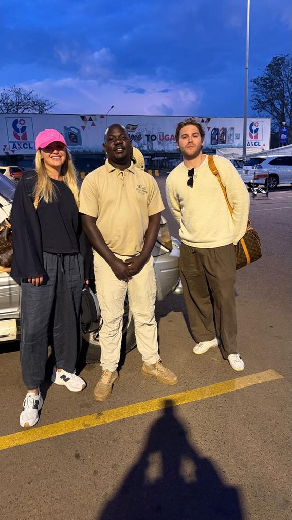 ali tyhe guide at airport with client